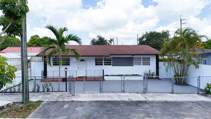 Property Photo: 1055 NW 32nd Ct FL 33125