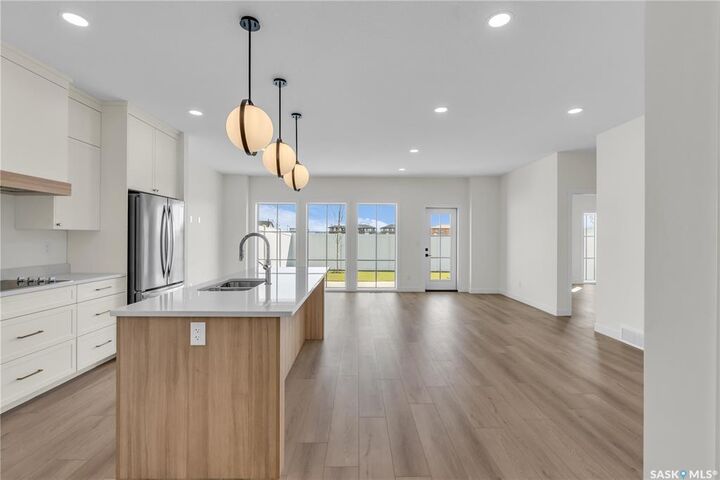 Property Photo:  720 Brighton Boulevard 10  SK S7V 1X1 