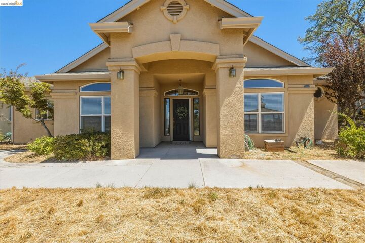 Property Photo: 16475 Crestridge Ave CA 95370