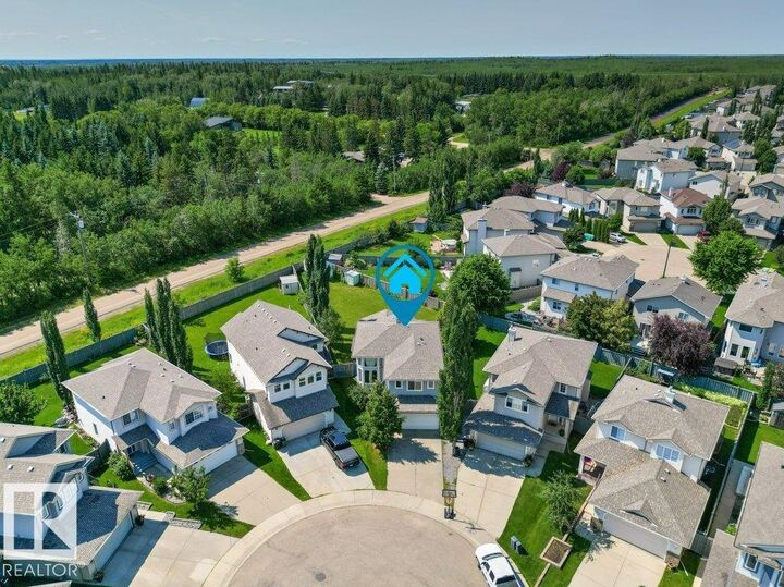 Property Photo: 4512 210 Street NW AB T6M 0G5
