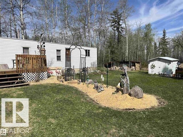 Property Photo: 210 55504 Nikoodi Road AB T0E 0X0