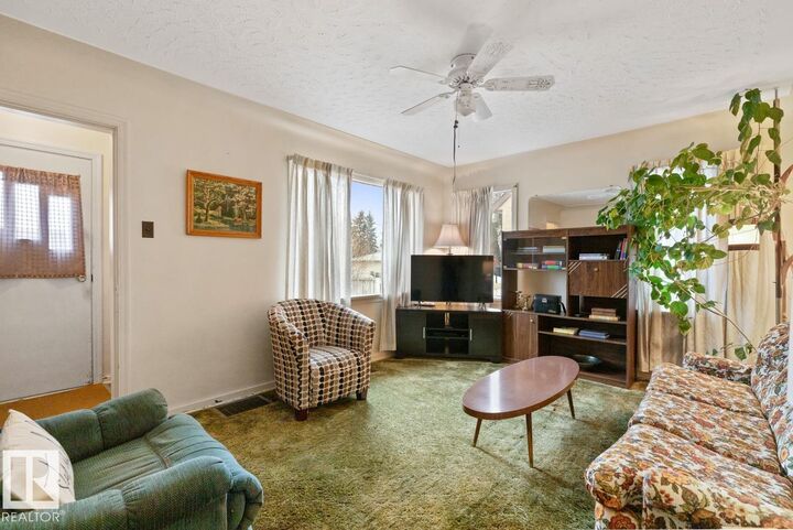 Property Photo:  12044 50 Street NW  AB T5W 3C4 