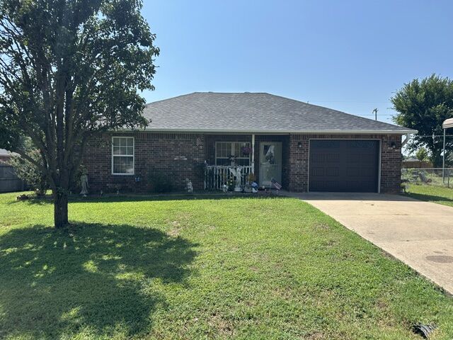 Property Photo: 707 Persimmon Street SW AR 72736