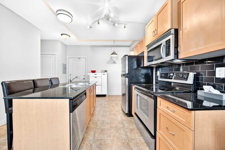 Property Photo: 11811 Lake Fraser Drive SE 5601 AB T2J 7J4