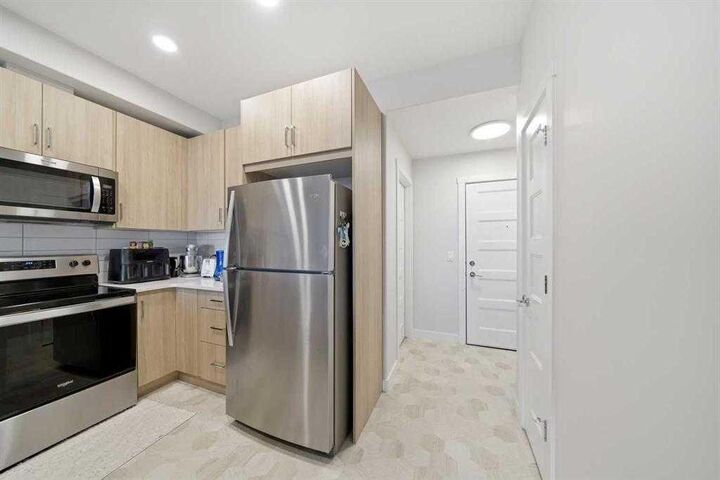 Property Photo: 55 Wolf Hollow Crescent SE 318 AB T2X 5K9