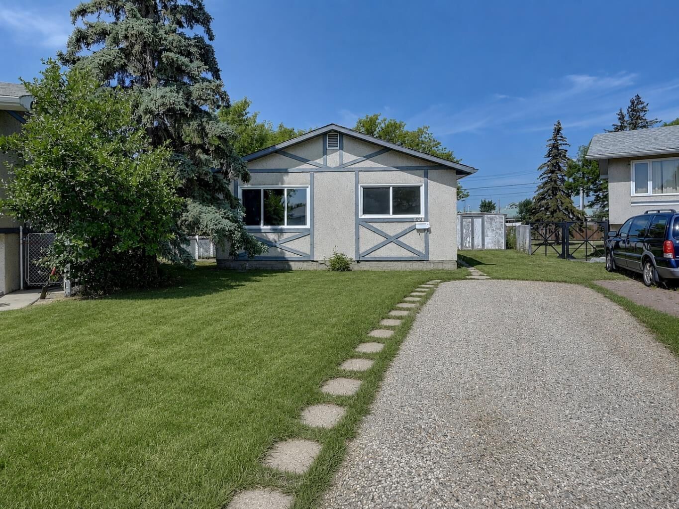 Property Photo:  11448 97 Street  AB T8V 3N2 