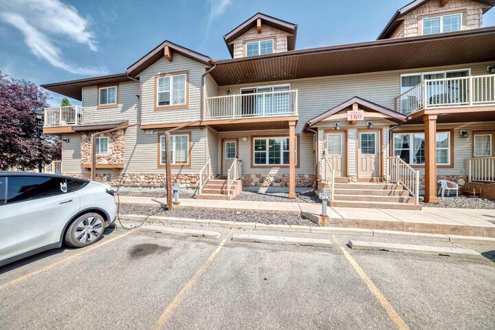 Property Photo: 160 Panatella Landing NW 103 AB T3K 4Y3