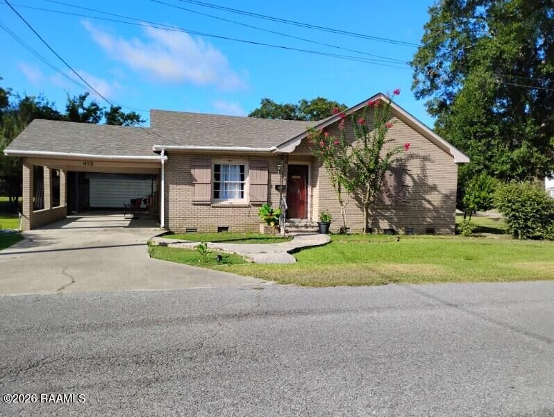 Property Photo:  413 W 3rd Street  LA 70548 