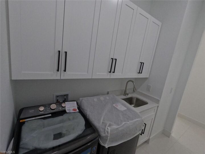 Property Photo: 2423 NW 6th St FL 33993