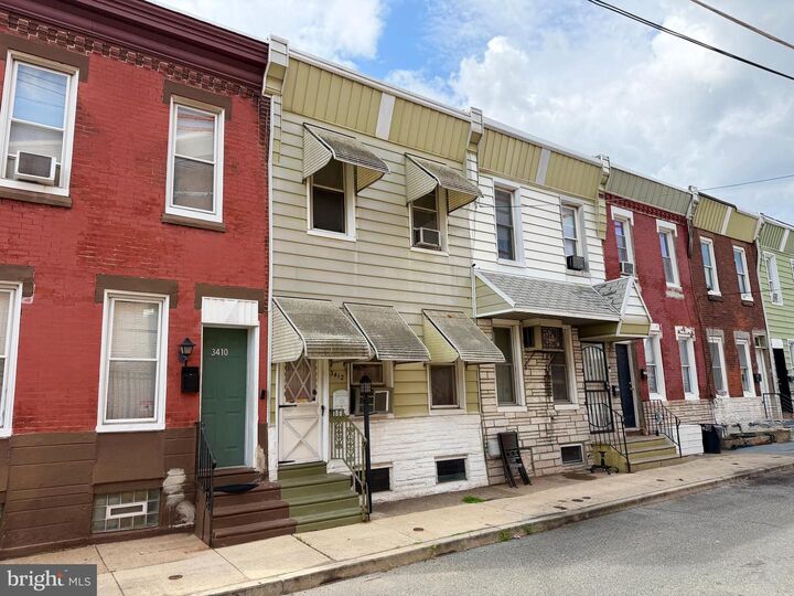 Property Photo:  3412 Braddock Street  PA 19134 