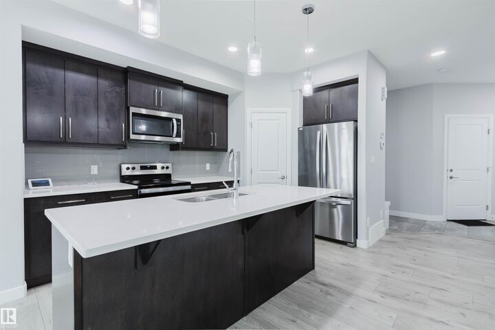 Property Photo: 6345 Cartmell Road SW AB T6W 4A3