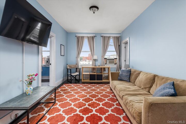 Property Photo:  37-75 64 Street 51  NY 11377 