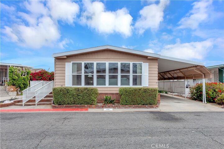 Property Photo: 18601 Newland Street 89 CA 92646
