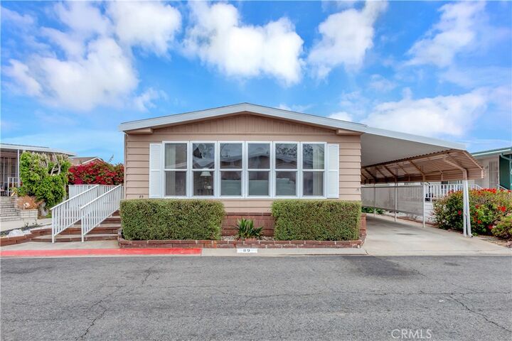Property Photo:  18601 Newland Street 89  CA 92646 