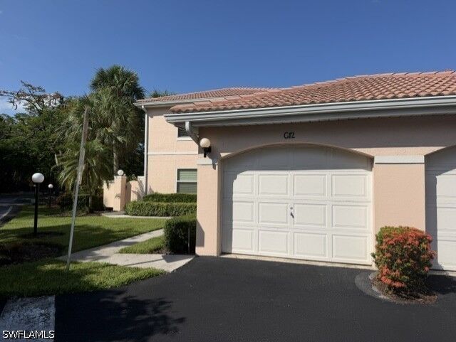 Property Photo: 628 Woodshire Lane G12 FL 34105