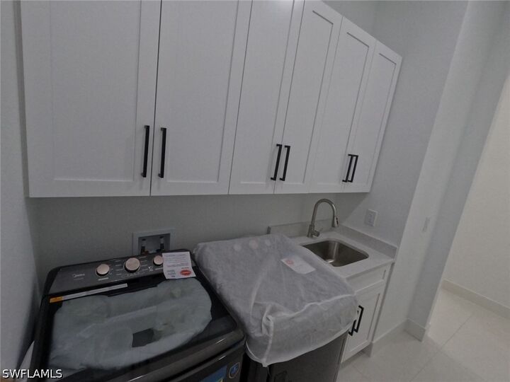 Property Photo:  2423 NW 6th Street  FL 33993 