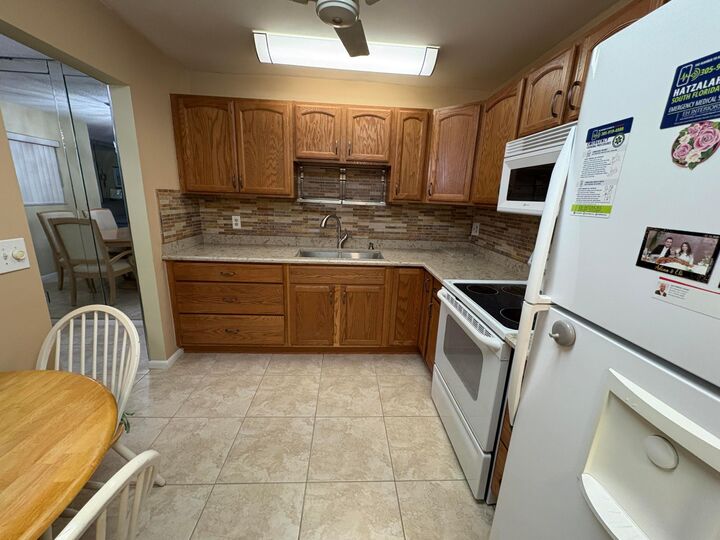 Property Photo:  160 Plymouth V  FL 33417 