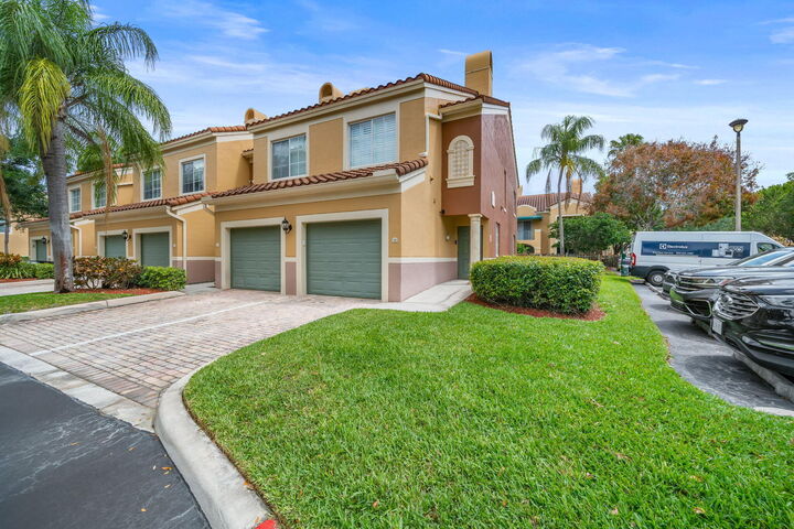 Property Photo:  11789 Saint Andrews Place 106  FL 33414 