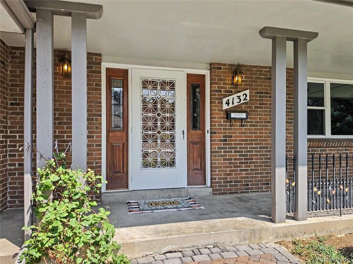 Property Photo:  4132 S Vrain Street  CO 80236 