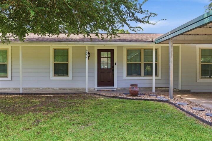 Property Photo: 407 Cypress TX 77665