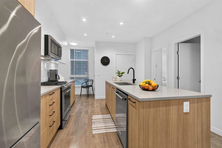 Property Photo: 707 Como Lake Avenue 103 BC V3J 0J5