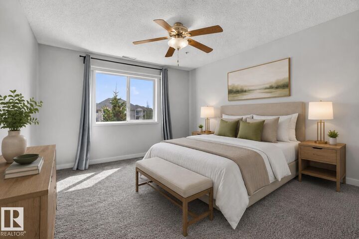 Property Photo: 16303 95 Street NW 319 AB T5Z 3V1