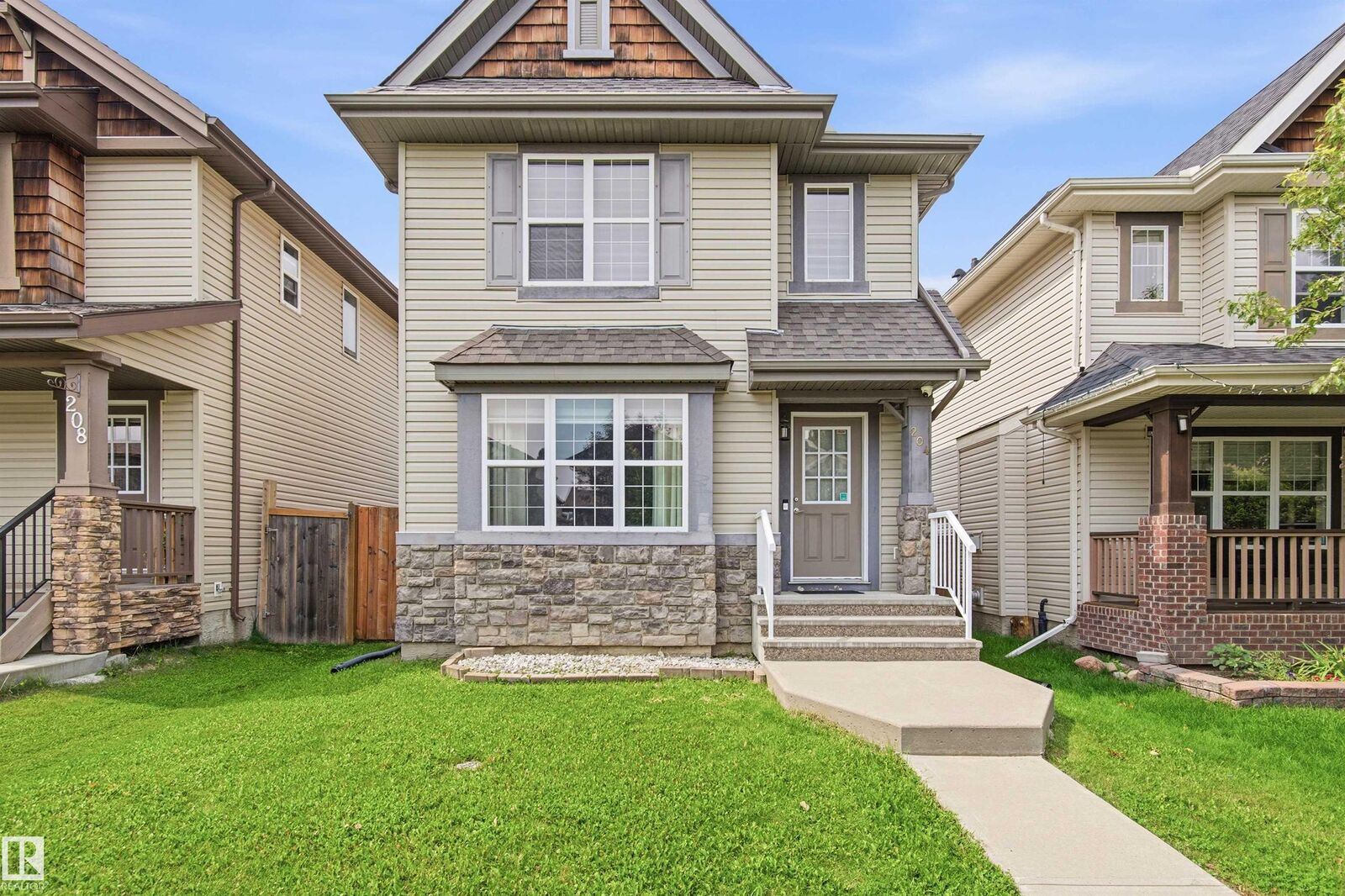 Property Photo:  204 59 Street SW  AB T6X 0E9 
