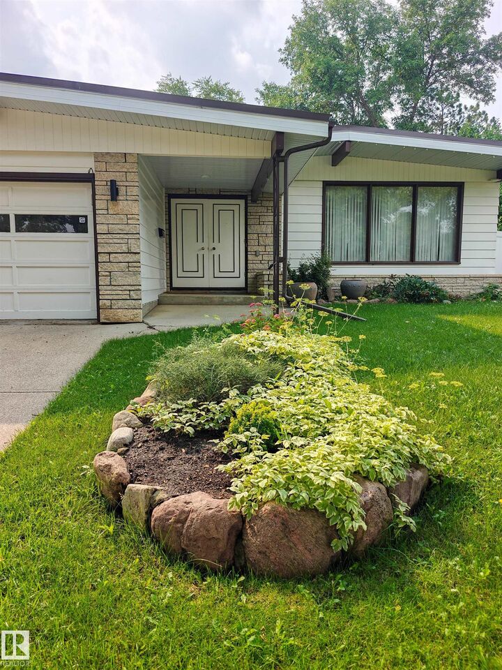 Property Photo:  15012 63 Street NW  AB T5A 2B8 