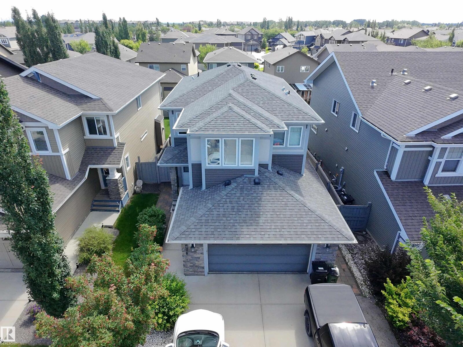 Property Photo:  8719 218 Street NW  AB T5T 4R7 