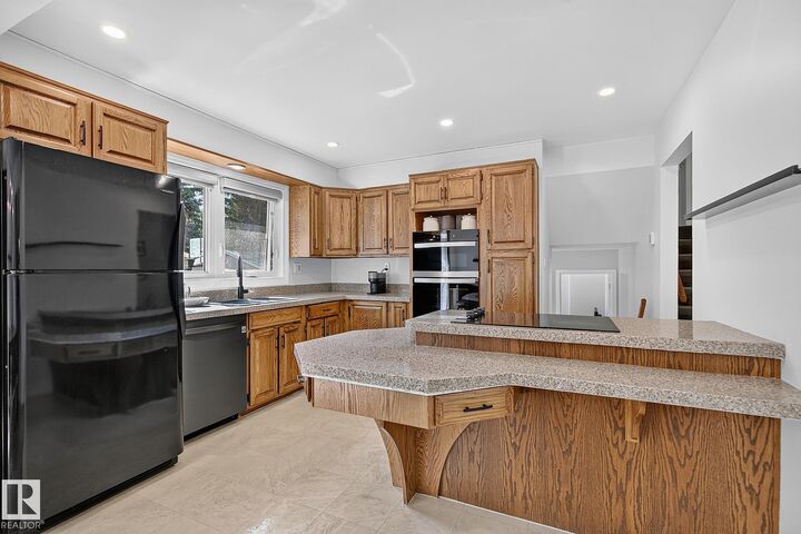 Property Photo: 7707 156 Street NW AB T5R 1X6