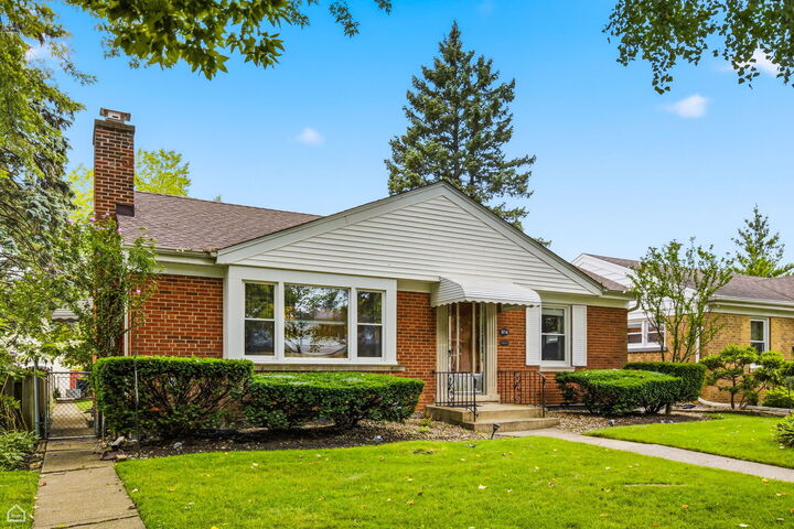 Property Photo: 8716 N Harding Avenue IL 60076