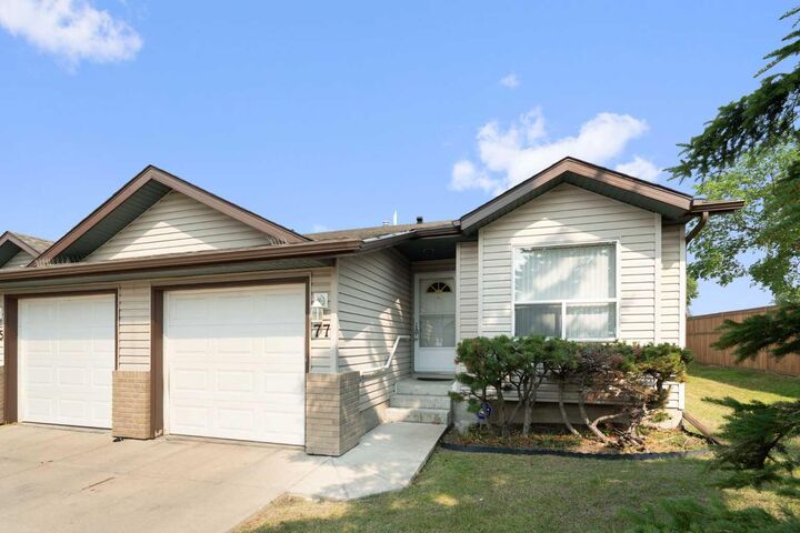 Property Photo:  77 Tararidge Circle NE  AB T3J 3W4 