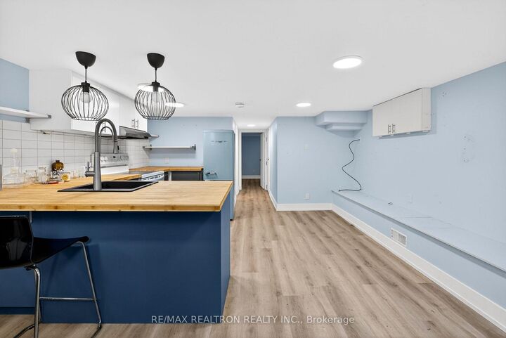 Property Photo:  92 Donlands Avenue Bsmt  ON M4J 3P1 