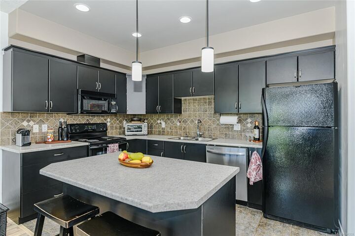 Property Photo: 3915 Carey Rd #205 BC V8Z 1Z6