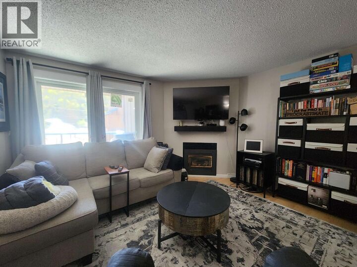 Property Photo: 3033 Ospika Boulevard 202 BC V2N 4L5