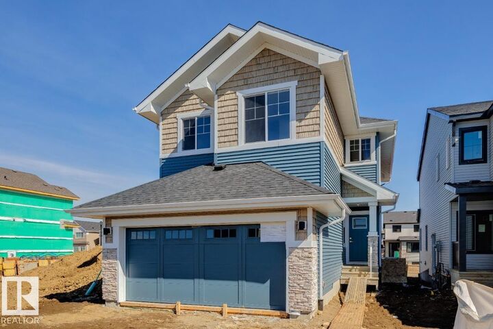 Property Photo: 5033 Cawsey Link SW AB T6W 4B5