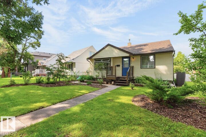 Property Photo:  11834 59 Street NW  AB T5W 3X7 