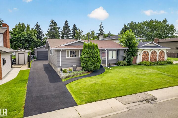 Property Photo:  11727 27 Avenue NW  AB T6J 3N7 