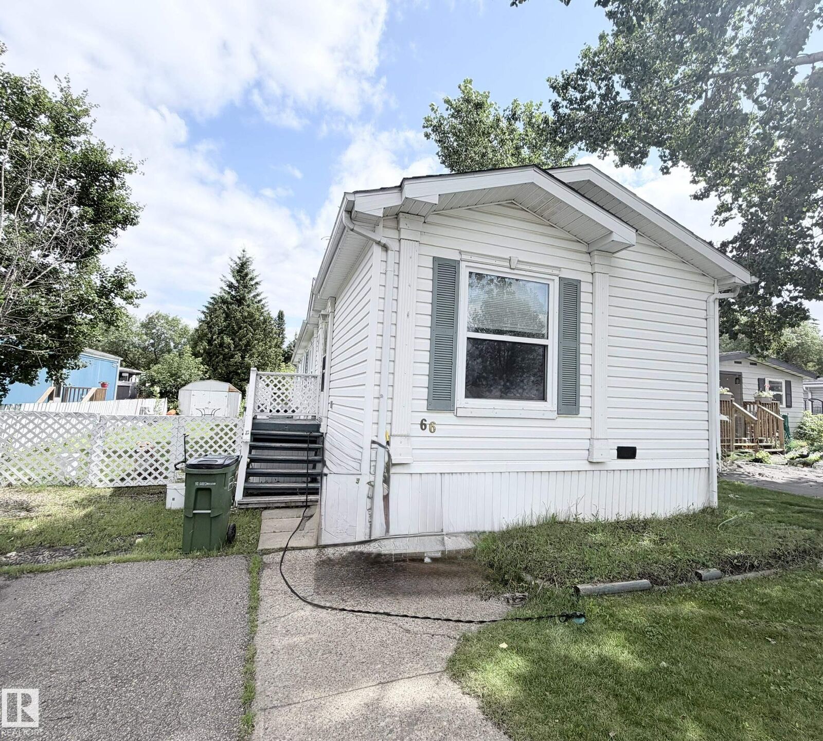 Property Photo: 66 The Parkway NW AB T6P 1G2