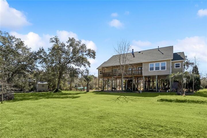 Property Photo: 238 Coin Du Lestin Drive LA 70460