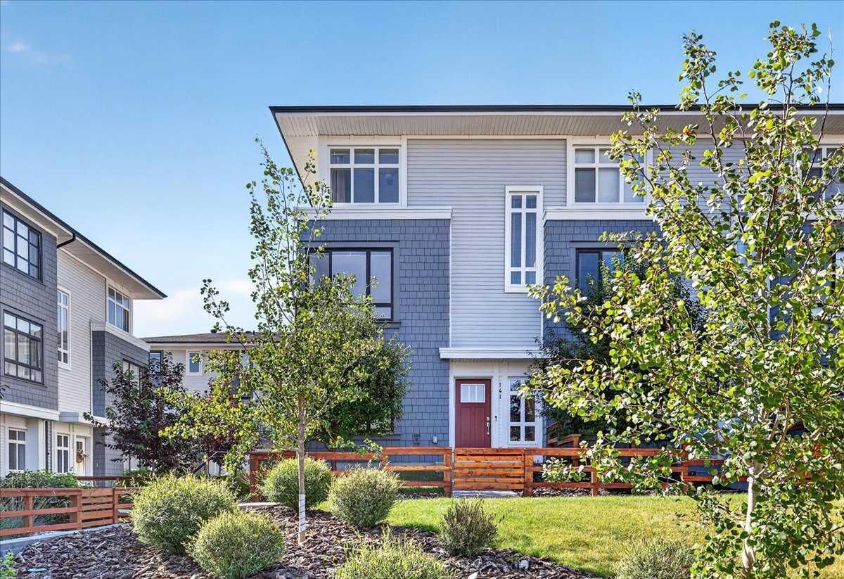 Property Photo: 857 Belmont Drive SW 141 AB T2X 4P2
