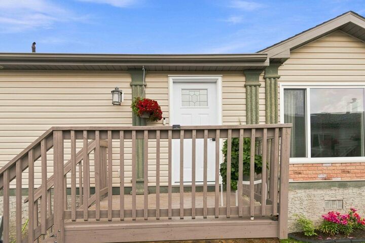 Property Photo: 105 Sumac Crescent AB T9K 0H8