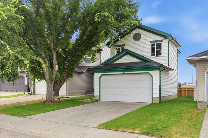 Property Photo: 129 Hidden Spring Circle NW AB T3A 5H4