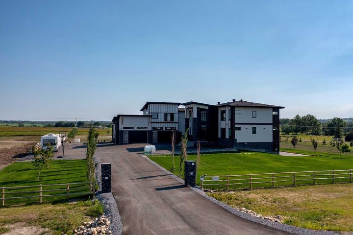 Property Photo: 48017 Harvest Lane E AB T1S 3R6