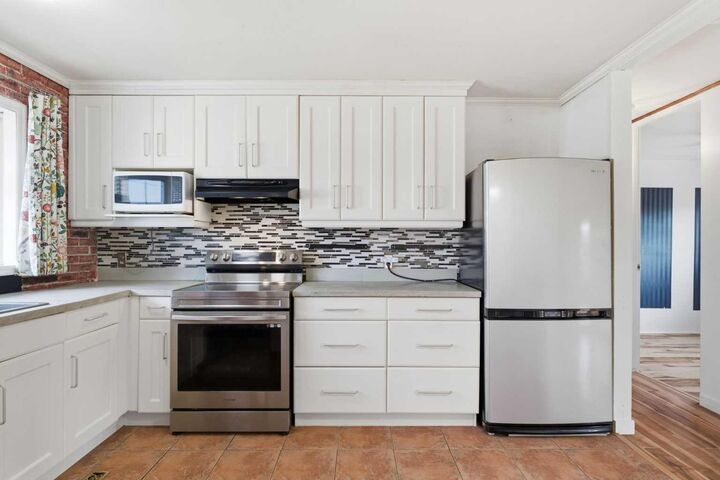 Property Photo:  7807 Olympia Bay SE  AB T2C 1N7 