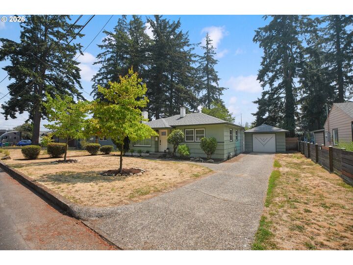 Property Photo:  12050 NE Broadway  OR 97220 