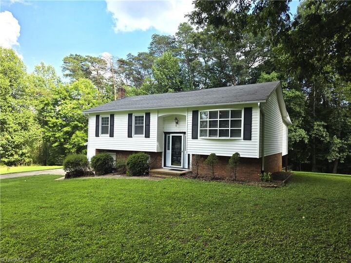 Property Photo:  414 Oak Ridge Drive  NC 27030 