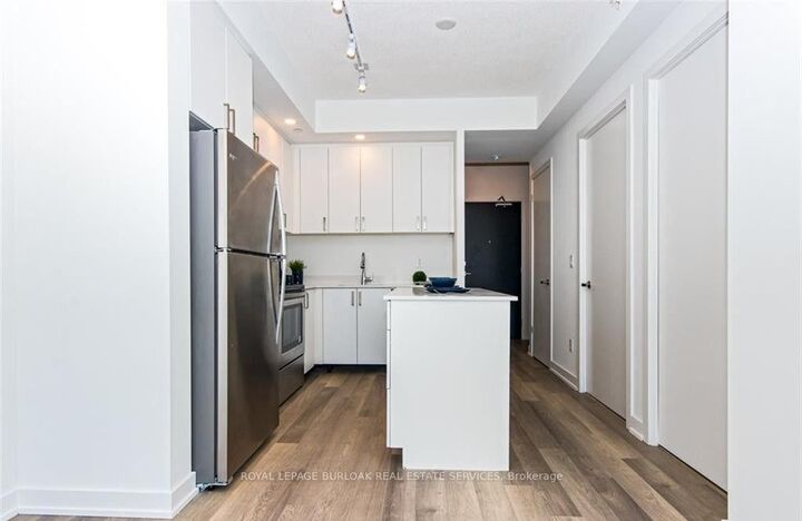 Property Photo: 5240 Dundas Street B505 ON L7L 0J6