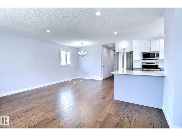 Property Photo: 14732 32 St NW AB T5Y 2G3