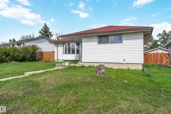 Property Photo: 13303 58 Street NW AB T5A 0P9